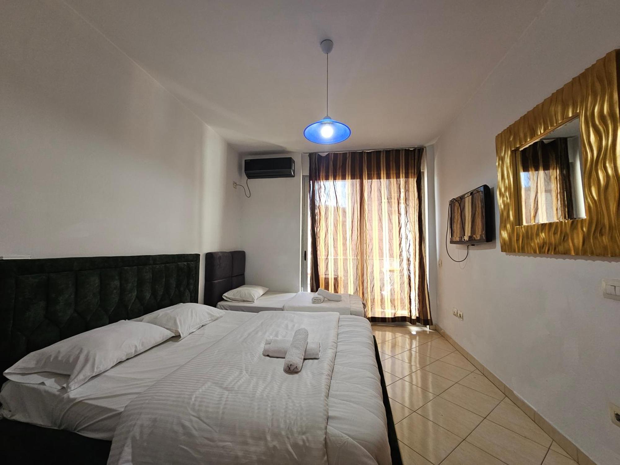 Aura Skanderbeg Square Apartments Тирана Экстерьер фото